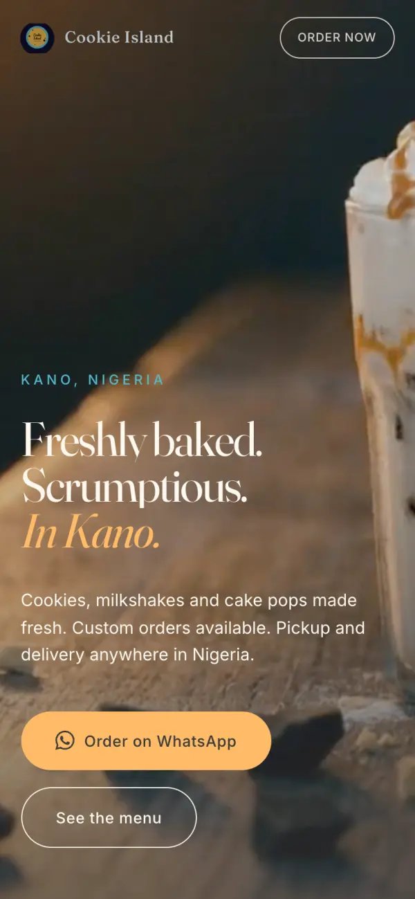 The Cookie Island homepage on a phone with an Order on WhatsApp button